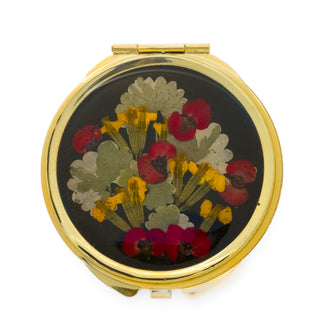 Espejo con euforbia, pericón y hojas silvestres