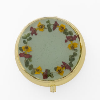 Pastillero redondo con bailarina y musgo