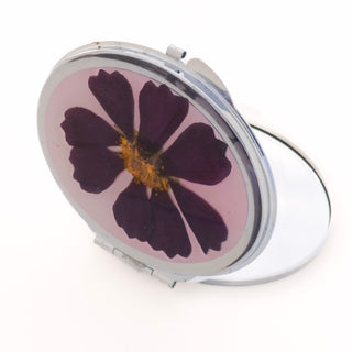 Espejo con flor cosmos