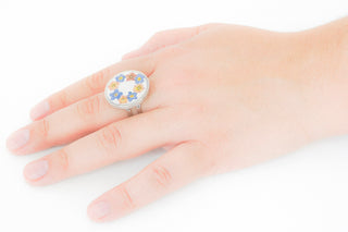 Anillo con nomeolvides y centros de bugambilia