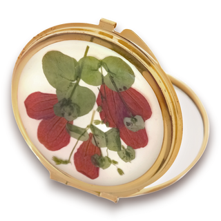 Mirror with San Miguelito petals and wild grass