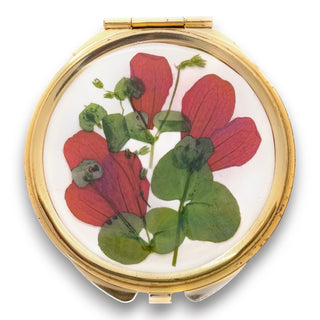 Mirror with San Miguelito petals and wild grass
