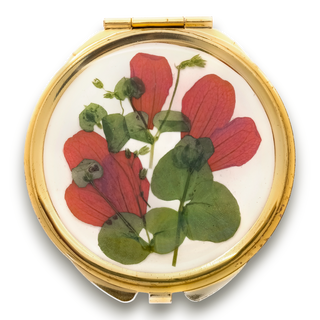 Mirror with San Miguelito petals and wild grass