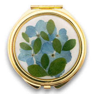 Mirror with euphorbia, Mexican marigold and wild leaves
