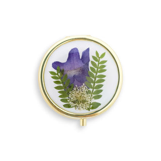 Pastillero con jacarandas y encaje
