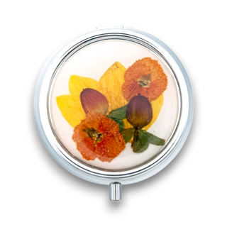 Mirror with euphorbia, Mexican marigold and wild leaves